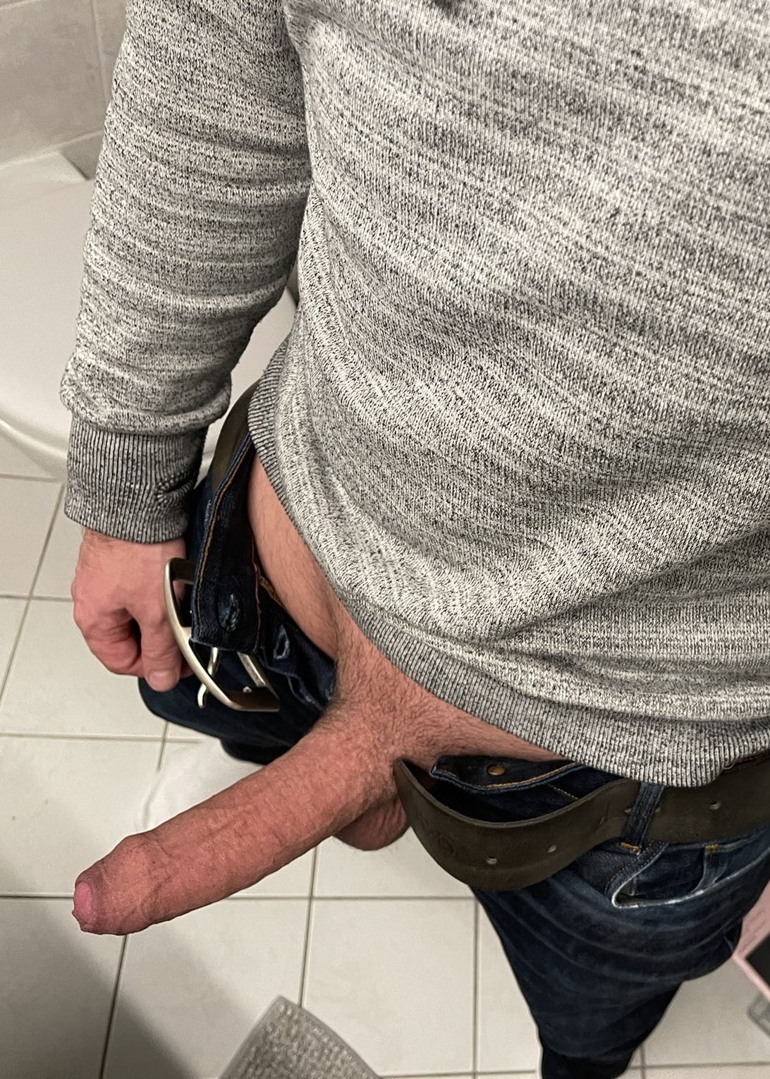 Clothed guy with his dick out