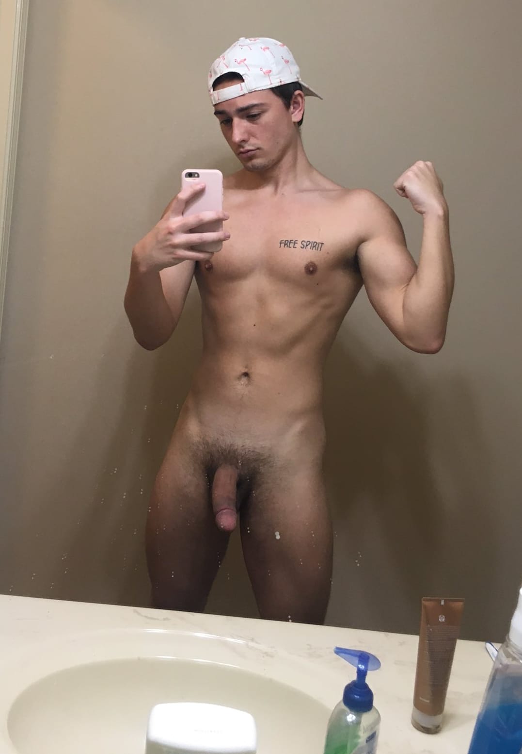 Flexing boy with a big cock