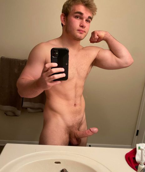 Horny nude boy flexing muscles