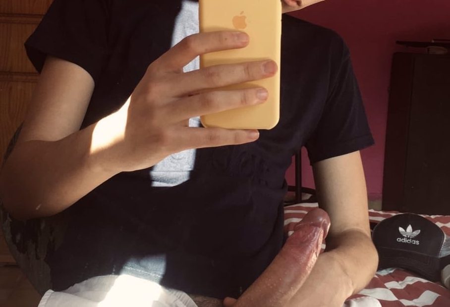 Latino taking a dick picture