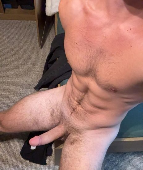 Nude stud with uncut cock