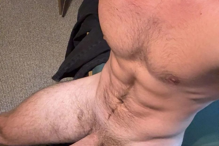 Nude stud with uncut cock