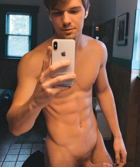 Sexy boy taking a nude selfie
