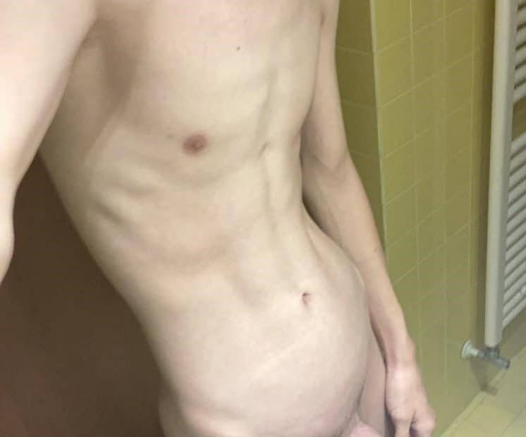 Slim nude guy with erection