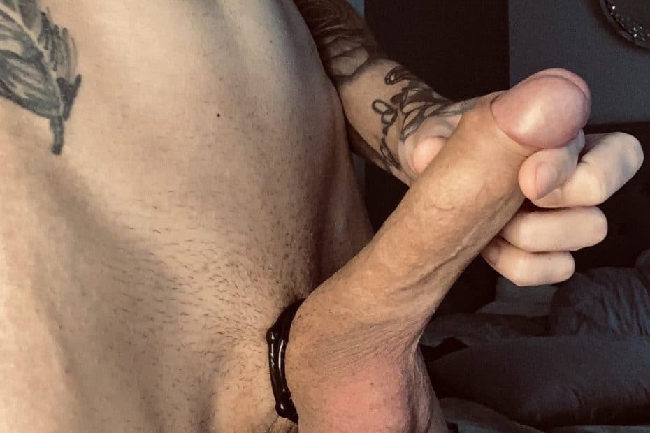 Tattooed guy with a shaved cock